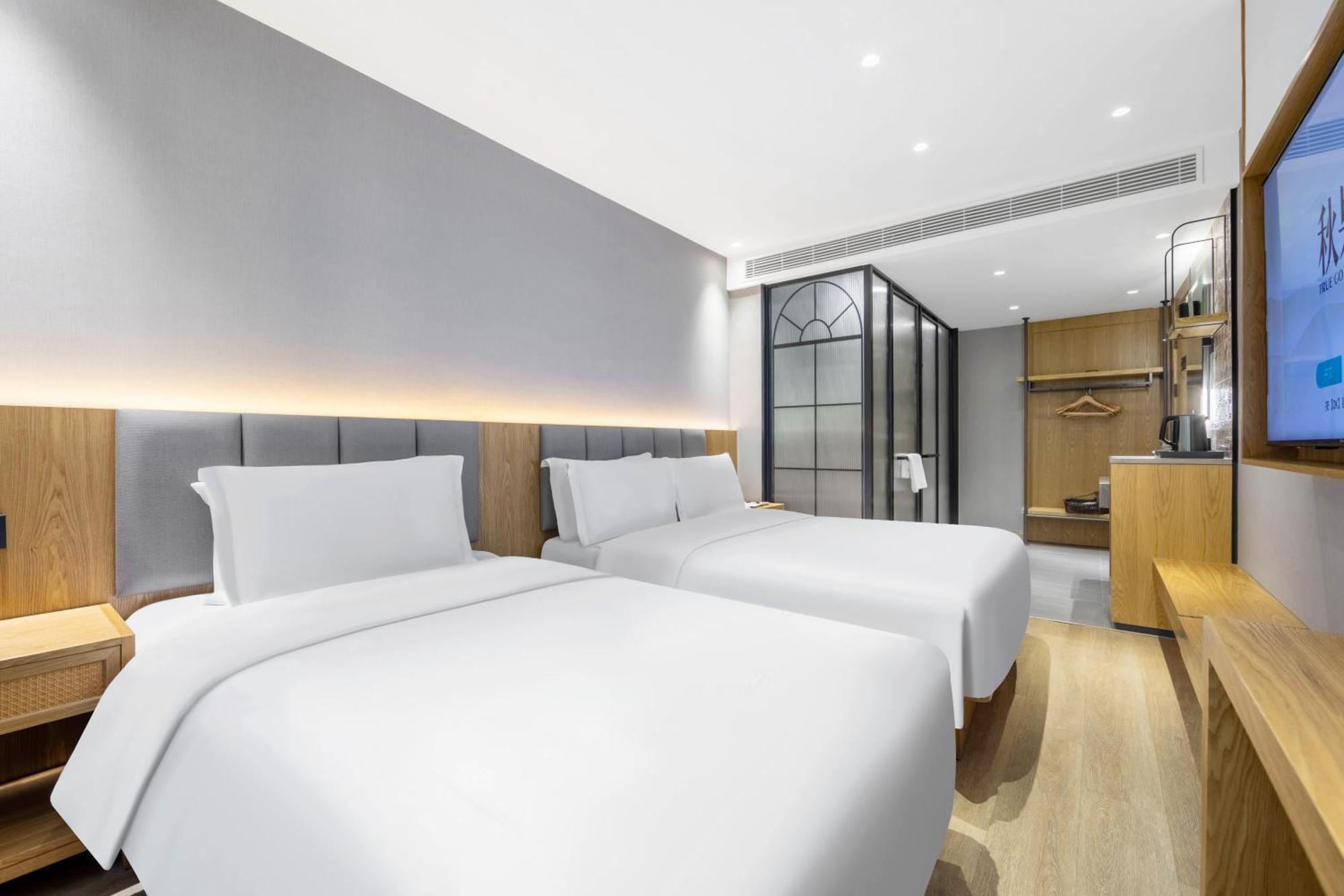 True Go Hotel - Shanghai Jing'An Temple Nanjing West Road Bagian luar foto